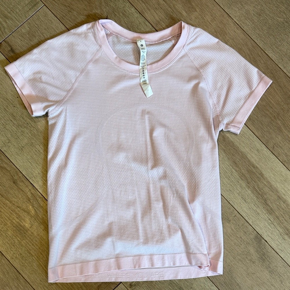 Lululemon Athletica Soft Pink Swiftly Tech Short-Sleeve Shirt 2.0
Hip Length